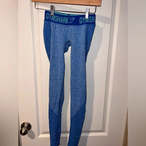 Gymshark leggings no size tag**. Measurements listed in description.